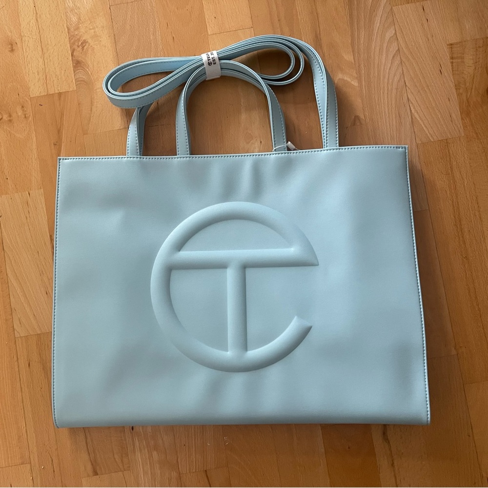 BNIB teflar size large (pool blue) --- (box and dustbag included)